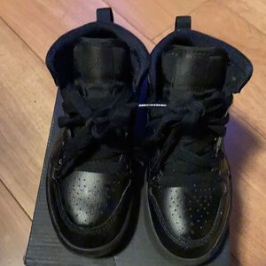 Black little boy Jordan 1 mids size 11